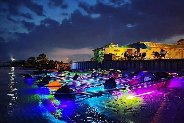 The fun, beautiful and colorful kayaks and paddle boards at Glow Paddle, Navarre Beach