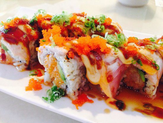 A colorful and beautifully decorated plate of sushi - such are the plates at Sushi Hana